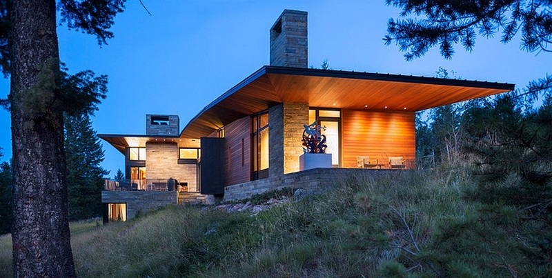 illuminated snow cabin