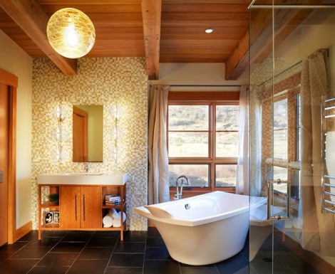 Interesting contrasts of light walls and black floor tiles in bathroom