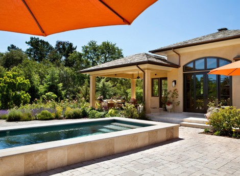 arched windows and rectangular pool