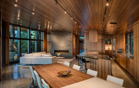 dark wood ceiling with contemporary light fittings