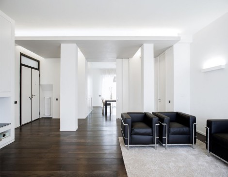 dark wood floors with white walls