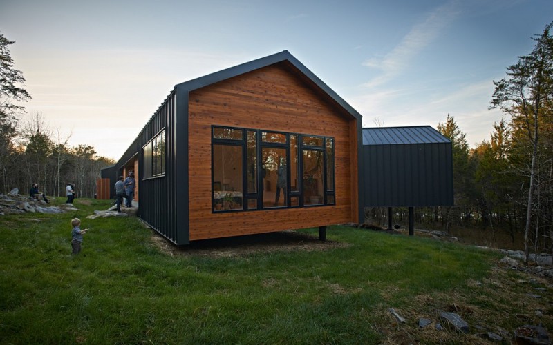 metal and cedar l shaped house