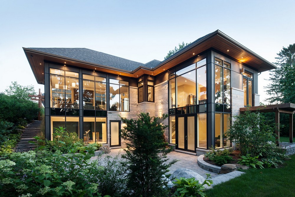 modern home with many windows 2 story