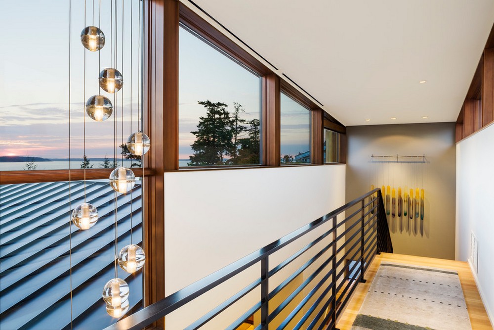 modernist light fitting next to metal staircase