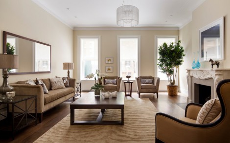 traditional beige living room with fireplace