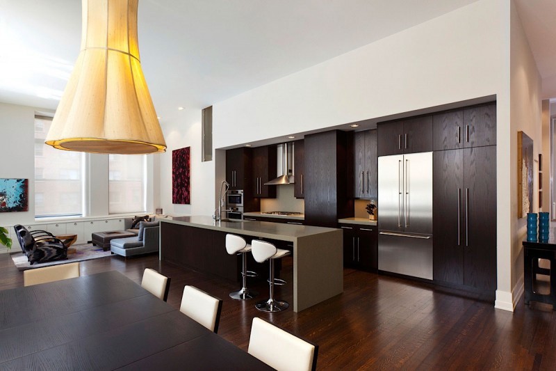 functional kitchen space with interesting light fitting