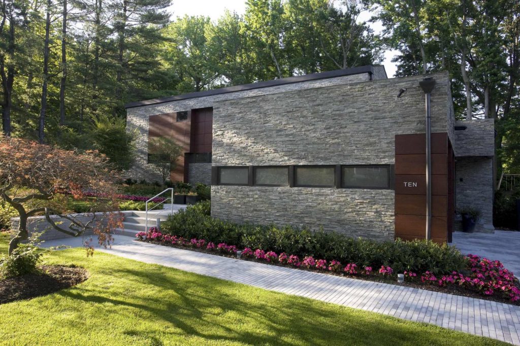 home with concrete block detailing on the facade